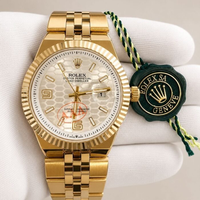 Rolex Land-Dweller Gold / White Motif Dial